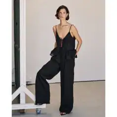 Stylish black lounge set for women with adjustable straps and relaxed fit, perfect for casual wear, home comfort, or sleepwear. Made from high-quality, breathable fabric for everyday comfort.