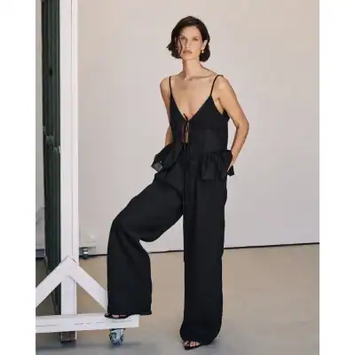 Stylish black lounge set for women with adjustable straps and relaxed fit, perfect for casual wear, home comfort, or sleepwear. Made from high-quality, breathable fabric for everyday comfort.