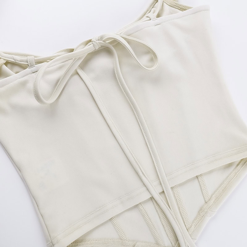 Comfortable white lace-up top with a stylish design, perfect for casual or professional wear, available at Monalisa Medical Store.