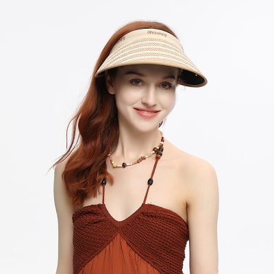 Stylish women’s sun visor hat with wide brim for sun protection, ideal for outdoor wear and fashion accessories.