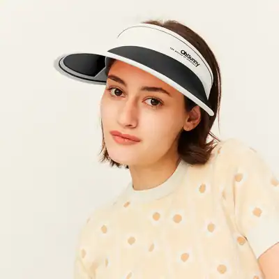 Stylish women's visor hat with sun protection, perfect for outdoor activities and fashion. Comfortable, lightweight, and adjustable for all-day wear.