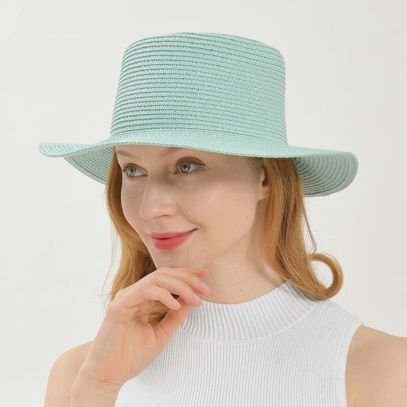 Stylish light blue wide-brim hat perfect for sun protection and outdoor fashion, ideal for vacation, beach, or casual wear.