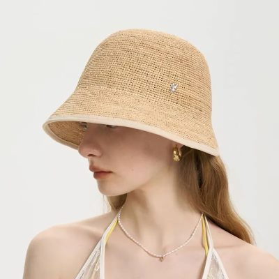 Stylish woven sun hat for women with wide brim, perfect for outdoor activities, UV protection, and fashion. Enhances summer fashion with elegant and comfortable design.
