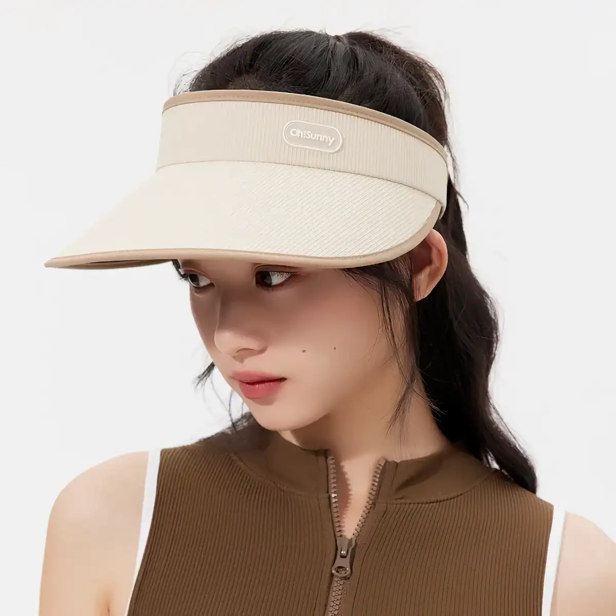 Sun visor hat for women, beige color, lightweight and adjustable, perfect for outdoor activities, sports, and daily sun protection.