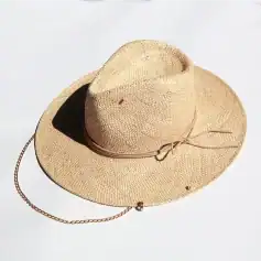 Natural woven straw sun hat with a chin strap for women and men, perfect for outdoor protection and fashion accessories.