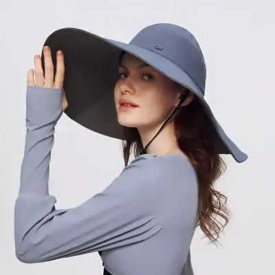 Elegant wide-brim sun hat ideal for UV protection, fashion-forward outdoor accessories for women, perfect for beach, travel, and sunny days.