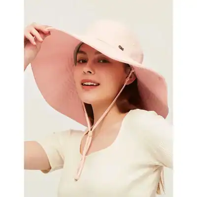 Stylish wide-brimmed pink summer sunhat for women, perfect for outdoor activities, beaches, and fashion accessories, designed to shield your face from harmful UV rays.