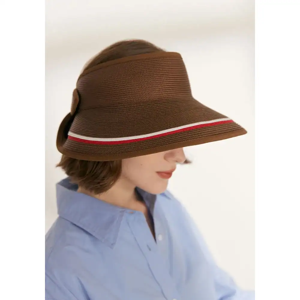 Brown wide-brim sun hat with a red and white stripe, perfect for sun protection and fashion. Lightweight, breathable, and ideal for outdoor activities, travel, or casual wear.