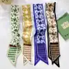 Various colorful floral-patterned ribbons for fashion, crafting, and accessories. High-quality, stylish design suited for headbands, belts, or decorative purposes.
