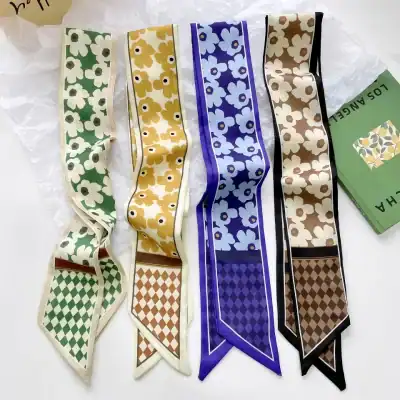 Various colorful floral-patterned ribbons for fashion, crafting, and accessories. High-quality, stylish design suited for headbands, belts, or decorative purposes.