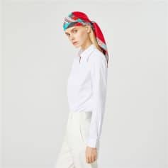 Stylish, colorful headscarf with geometric patterns ideal for women seeking chic accessories. Perfect for fashion-forward looks and everyday wear, adding flair and sophistication.