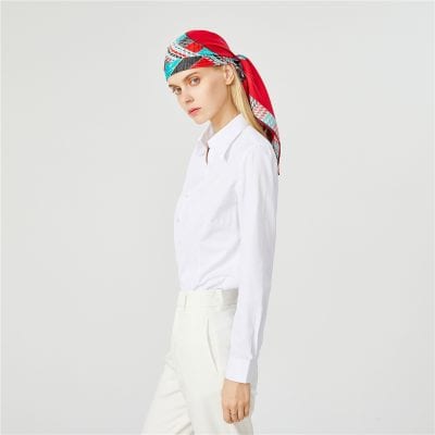 Stylish, colorful headscarf with geometric patterns ideal for women seeking chic accessories. Perfect for fashion-forward looks and everyday wear, adding flair and sophistication.