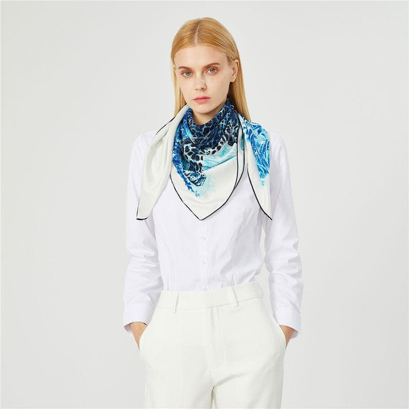 Stylish blue and white silk scarf perfect for women to elevate their optical look.