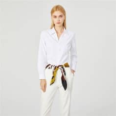 A stylish, classic white button-up shirt for women, perfect for professional or casual outfits, available at Monalisa Store.