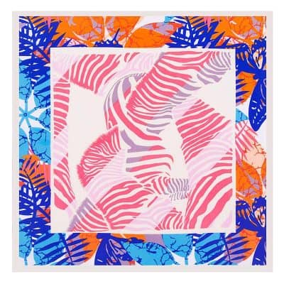 Bright tropical leaf print scarf featuring bold pink, orange, blue, and purple hues, perfect for stylish summer accessories or gift options.