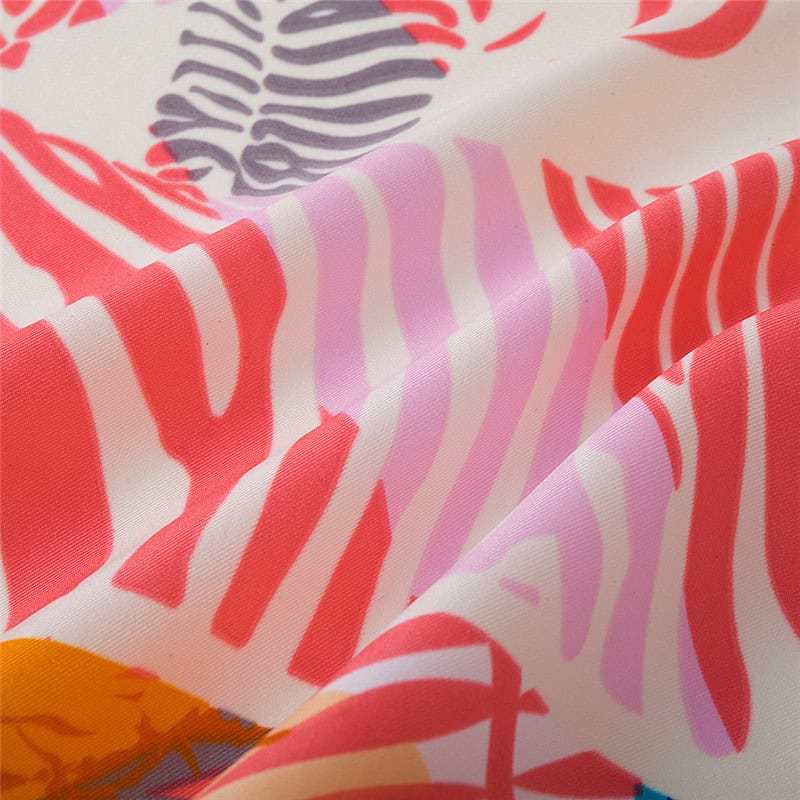 Bright, colorful fabric with pink, red, orange, and purple patterns, perfect for foldable sunglasses, eyewear cases, or accessories at Monalisa Medical store.