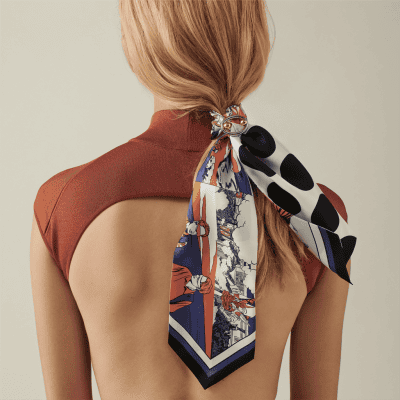 A stylish and vibrant women's hair scarf with a bold printed design, perfect for day-to-night fashion, hair accessories, and adding a chic touch to any outfit.