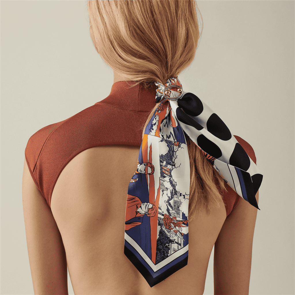 A stylish and vibrant women's hair scarf with a bold printed design, perfect for day-to-night fashion, hair accessories, and adding a chic touch to any outfit.