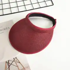 Red sun visor hat offers UV protection and lightweight comfort for outdoor activities. Perfect for women and men, adds a stylish touch to casual, sports, or beach outfits.