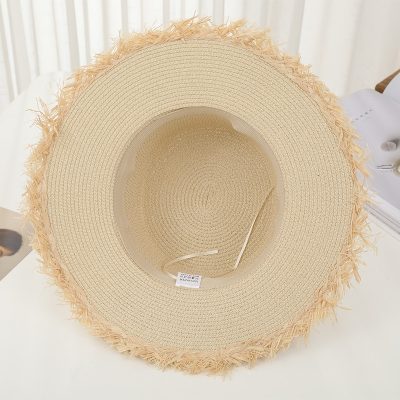 Sun hat with wide brim, perfect for summer outdoor activities and stylish protection from the sun. Made of lightweight woven straw, ideal for beach, garden, or casual wear.