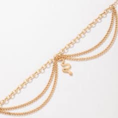 Elegant gold layered chain necklace with snake pendant, perfect for fashionable accessories and jewelry gifts.