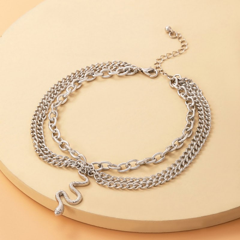 Elegant silver chain necklace with a snake pendant, perfect for gift or fashion statement. High-quality jewelry for women, suitable for all occasions.