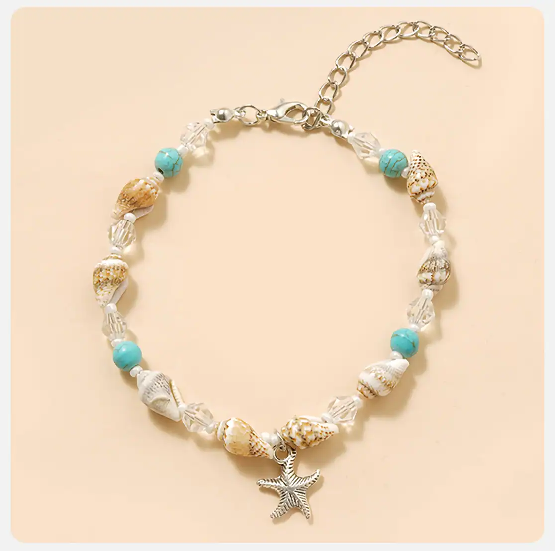 Elegant beach shell jewelry with starfish pendant, turquoise beads, and clear crystals, perfect for summer or vacation accessories, available at Monalisa Store for stylish beachwear.