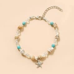 Beautiful seashell and starfish pendant necklace featuring turquoise and clear beads, perfect for beach, summer, and ocean-themed jewelry. Elegant, trendy, and ideal for coastal fashion accessories.