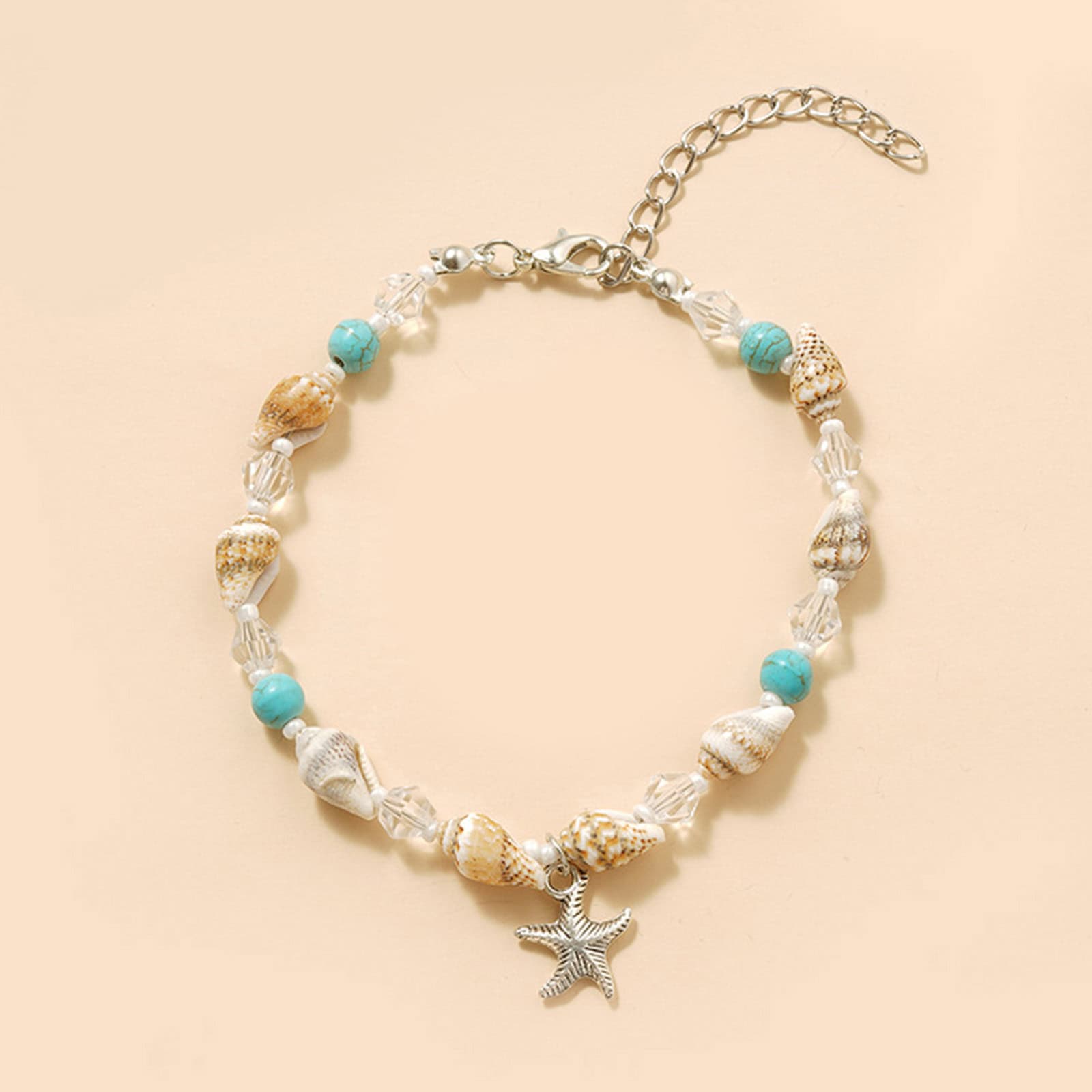 Beautiful seashell and starfish pendant necklace featuring turquoise and clear beads, perfect for beach, summer, and ocean-themed jewelry. Elegant, trendy, and ideal for coastal fashion accessories.