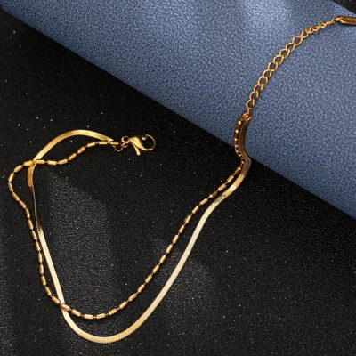 Luxurious gold necklace jewelry with layered chain design, perfect for women seeking stylish accessories at Monalisa Store.