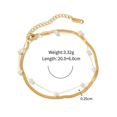 High-quality gold chain necklace featuring white bead accents, adjustable length, and a delicate design perfect for stylish accessories.