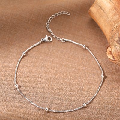 Stylish silver necklace with spherical accents, perfect for women's accessories and jewelry collection. Crafted for elegance and everyday wear.