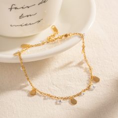 Delicate gold necklace with teardrop pendants and crystal accents, perfect for women's fashion accessories. Ideal for gift-giving or enhancing your everyday look with luxury jewelry.