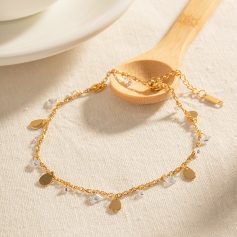 Delicate gold necklace featuring sparkling crystal charms, perfect for stylish occasions and daily wear. Elevate your look with this beautiful jewelry piece from Monalisa Store.