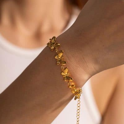 Gold butterfly charm bracelet for women, stylish jewelry accessory, perfect for gift or everyday wear, enhancing your fashion statement with a touch of elegance.