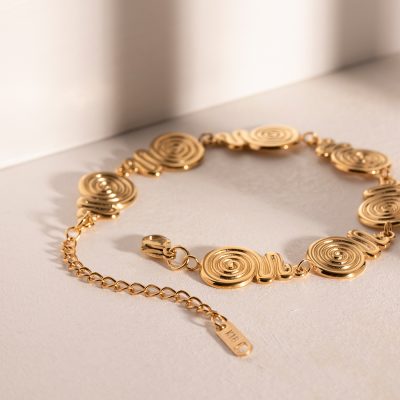 Luxurious gold spiral necklace available at Monalisa Medical Store, perfect for stylish women seeking premium opt jewelry accessories. Enhance your look with our sophisticated, high-quality optical jewelry pieces.