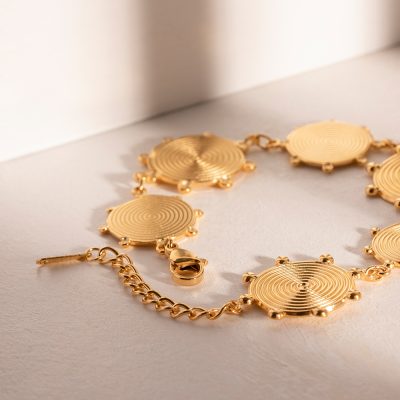 Luxury gold jewelry jewelry set featuring circular design, perfect for classy events and daily wear. Shop authentic gold jewelry at Monalisa Medical Store for quality and style.