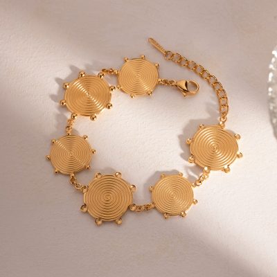 Luxury gold jewelry bracelet featuring circular disc charms, perfect for women seeking fashionable accessories with high-quality craftsmanship at Monalisa Store.