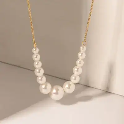 Delicate pearl necklace with gold chain, perfect for elegant occasions. Shop the best quality pearl jewelry at Monalisa Store for a luxurious look.