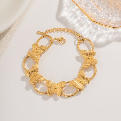 Elegant gold butterfly necklace with intricate design, perfect for stylish accessories and gift ideas. Great for women’s jewelry collection and fashion statement pieces.