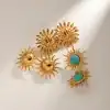 Elegant sun-shaped jewelry with gold finish, featuring turquoise accents and unique designs from Monalisa Medical's collection. Perfect for stylish accessories and jewelry lovers.