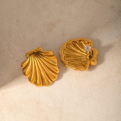 Elevate your style with luxurious gold shell earrings, ideal for jewelry lovers seeking unique, high-quality accessories. Perfect for gifting or personal collection.