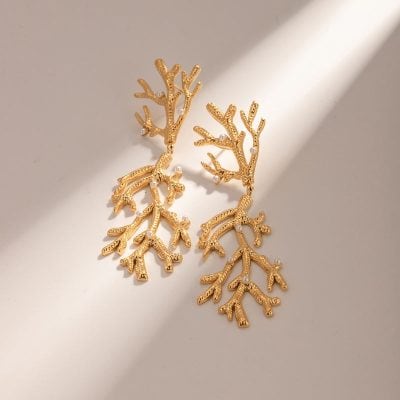 Elegant gold coral branch earrings, perfect for stylish jewelry enthusiasts, available at Monalisa Medical Store. Enhance your accessory collection with unique, nature-inspired jewelry pieces.