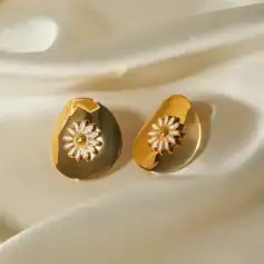 Cute daisy flower earrings with gold finish, perfect for women’s jewelry collection, ideal for special occasions and daily wear.