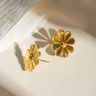 Gold flower earrings, women’s jewelry, stylish accessories, high-quality gold plating, perfect for casual or formal wear, available at Monalisa Medical Store.