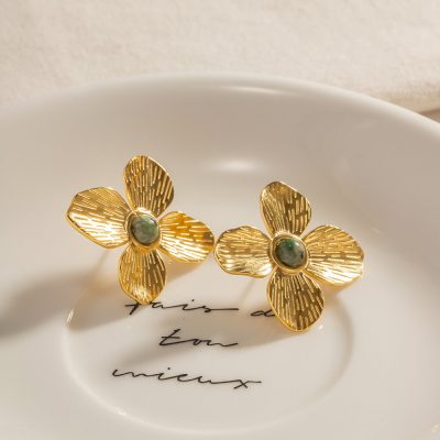 Stunning gold flower earrings featuring intricate petal design and green gemstone centers, perfect for stylish accessories and jewelry lovers. Shop at Monalisa Store for high-quality fashion jewelry.