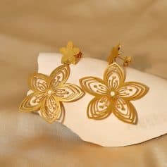 Gold butterfly earrings with intricate floral cutout design, perfect for women and special occasions. Stylish, lightweight, and high-quality jewelry from Monalisa Store.