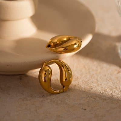 Luxurious gold earrings and rings, perfect for stylish women and special occasions. High-quality, trendy jewelry available at Monalisa Store for all your fashion needs.