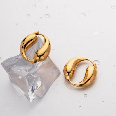 Stunning gold hoop earrings showcasing luxury jewelry for women, perfect for various occasions. Enhance your style with high-quality, trendy earrings from Monalisa Store.
