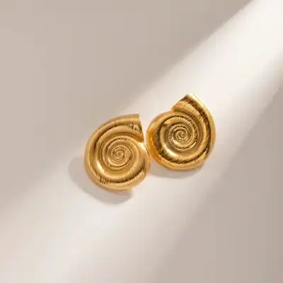 Stylish gold spiral earrings perfect for women, crafted with high-quality materials for a luxurious look. Ideal for daily wear, special occasions, or as a gift. Elevate your jewelry collection today.